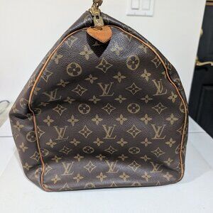 Louvis Vuitton Duffle Bag